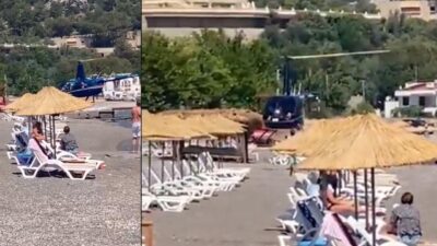 Plajda güneşlenenlerin arasına helikopter indi! Yemeğe gelmişler…