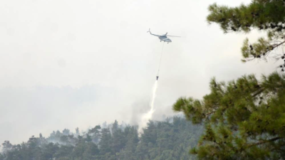 Köyceğiz yangınına 12 helikopter ve 2 uçak ile müdahale sürüyor