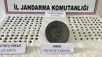 Çantasından yaklaşık 200 tarihi sikke çıktı