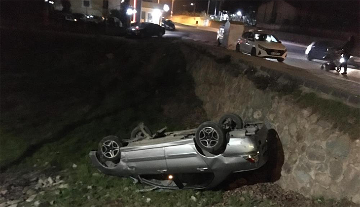 Sitenin bahçesine düşen otomobilden alkol şişesi çıktı